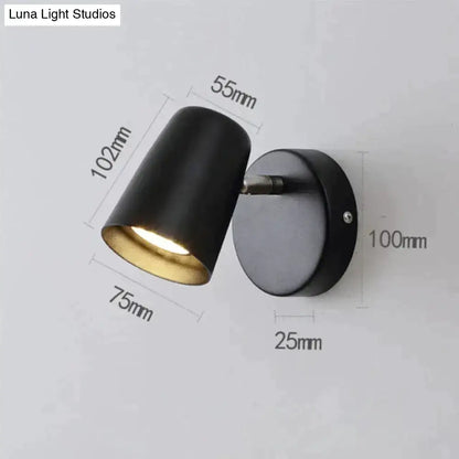 Decorbites Nickel LED Wall Sconce, black shade with gold interior, round backplate on Tampa Home & Garden Store