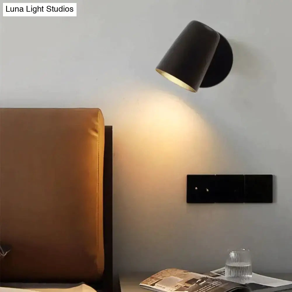 Nickel LED Wall Sconce by Decorbites; black conical shade, warm downlight above bedside on Tampa Home & Garden Store