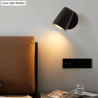 Nickel LED Wall Sconce by Decorbites; black conical shade, warm downlight above bedside on Tampa Home & Garden Store
