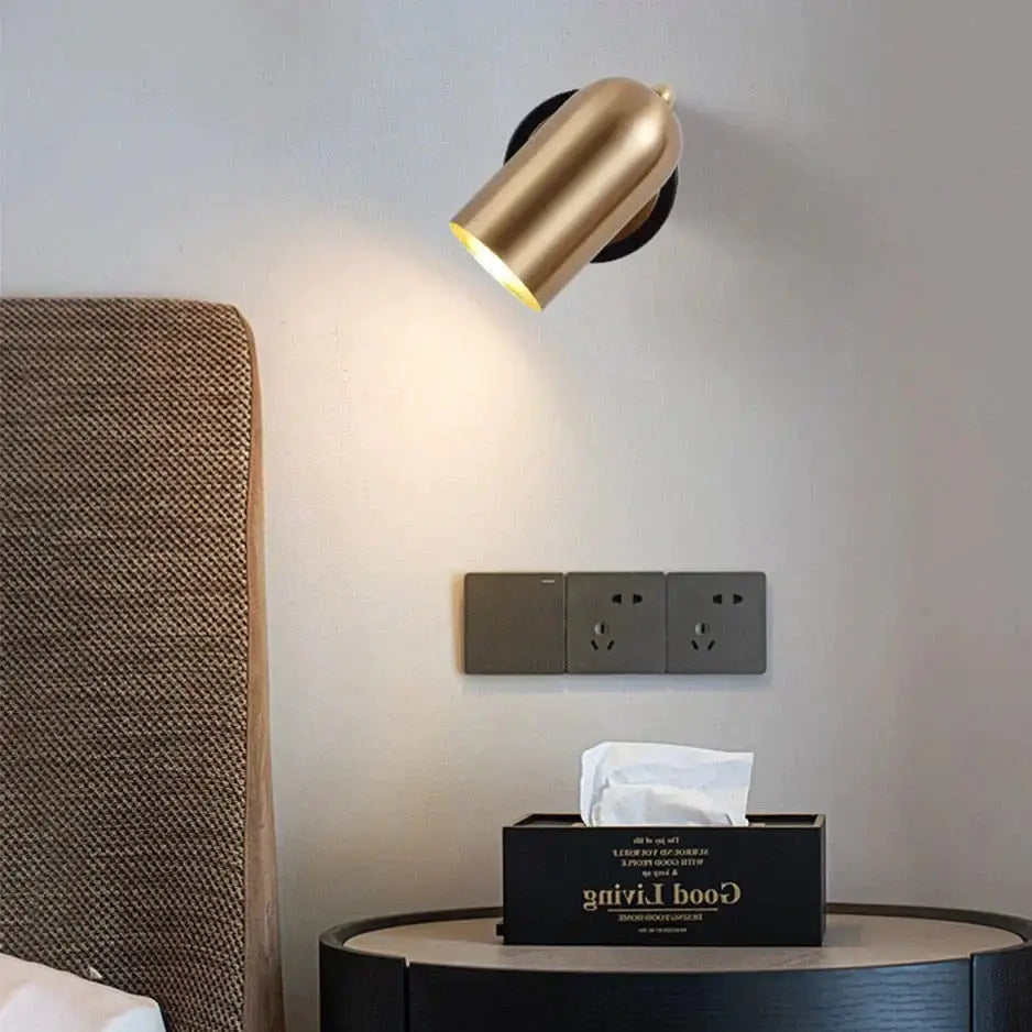 Nickel LED wall sconce with cylindrical brushed metal shade, wall mounted by Decorbites on Tampa Home & Garden Store