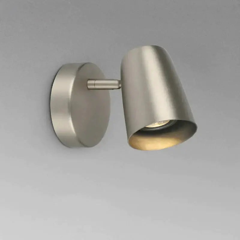 Nickel LED wall sconce by Decorbites, cylindrical metal shade on round wall plate on Tampa Home & Garden Store
