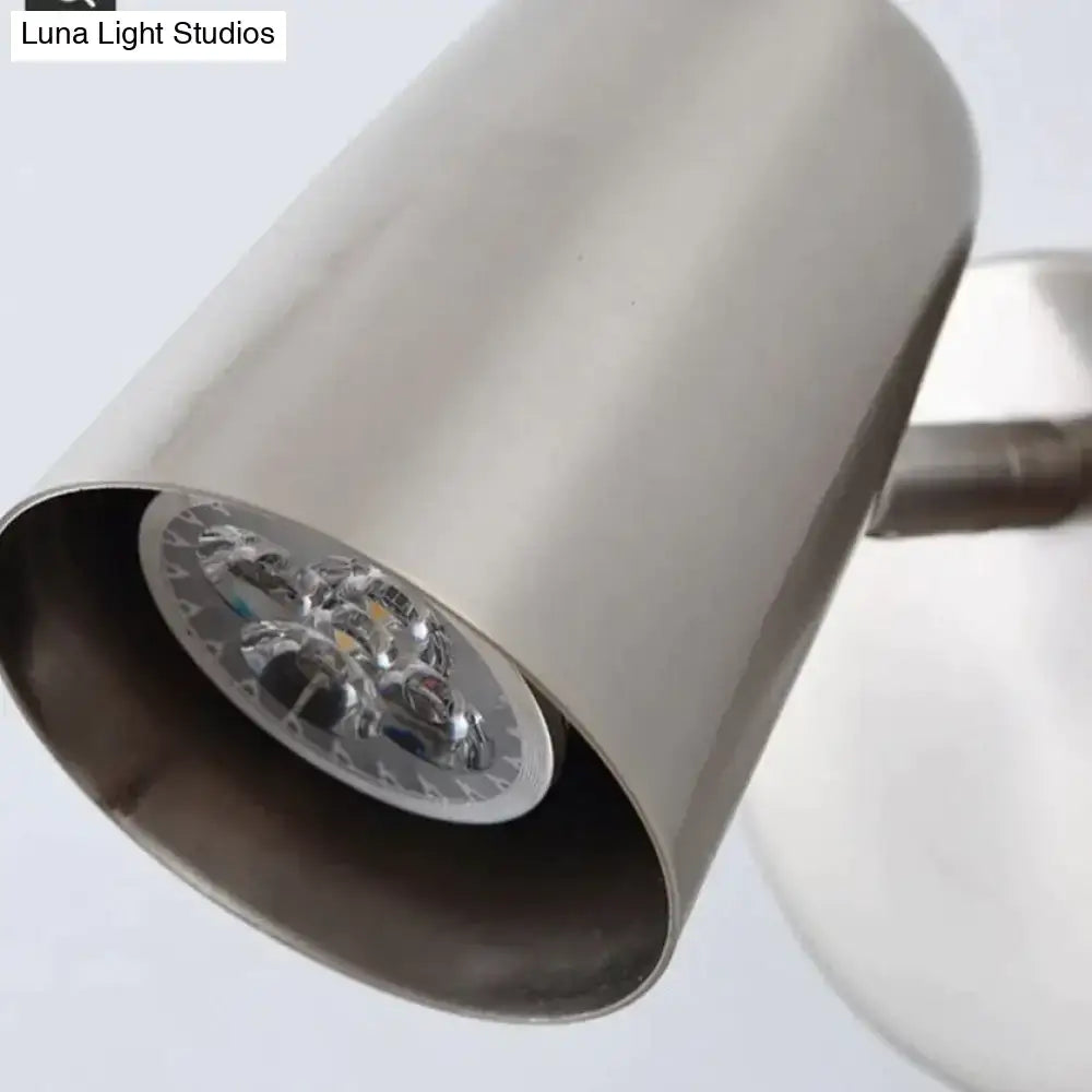 Nickel LED wall sconce with cylindrical brushed-metal shade and visible LED module on Tampa Home & Garden Store