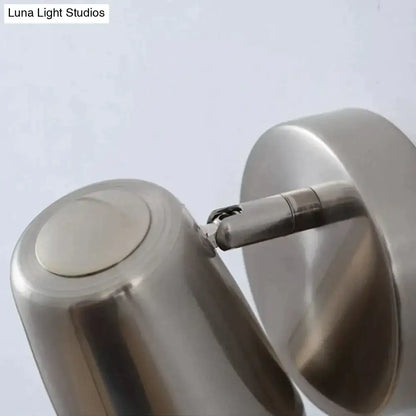 Nickel LED wall sconce with brushed metal finish and dual cylindrical heads on Tampa Home & Garden Store