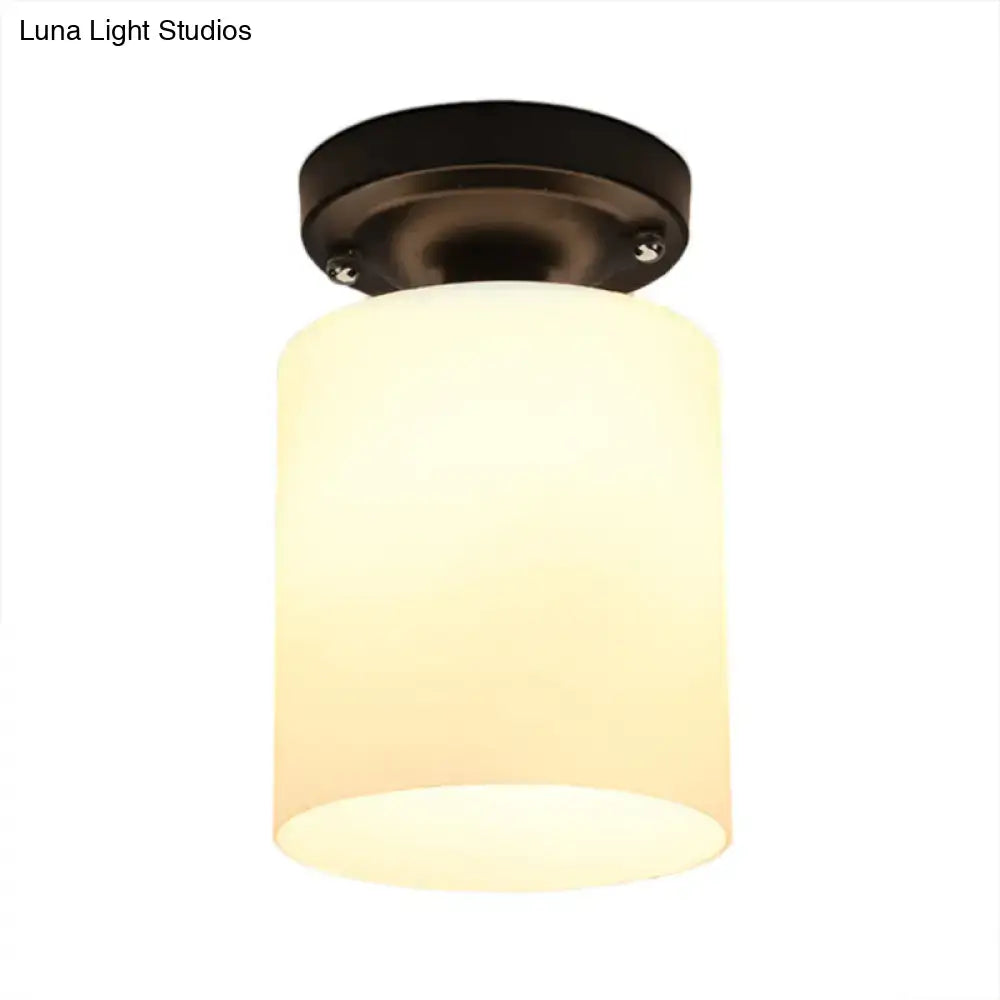 Decorbites Bronze Milky Glass Light ceiling fixture with frosted shade, bronze finish on Tampa Home & Garden Store