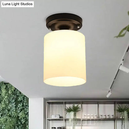 Decorbites Bronze Milky Glass Ceiling Light with warm glow on Tampa Home & Garden Store