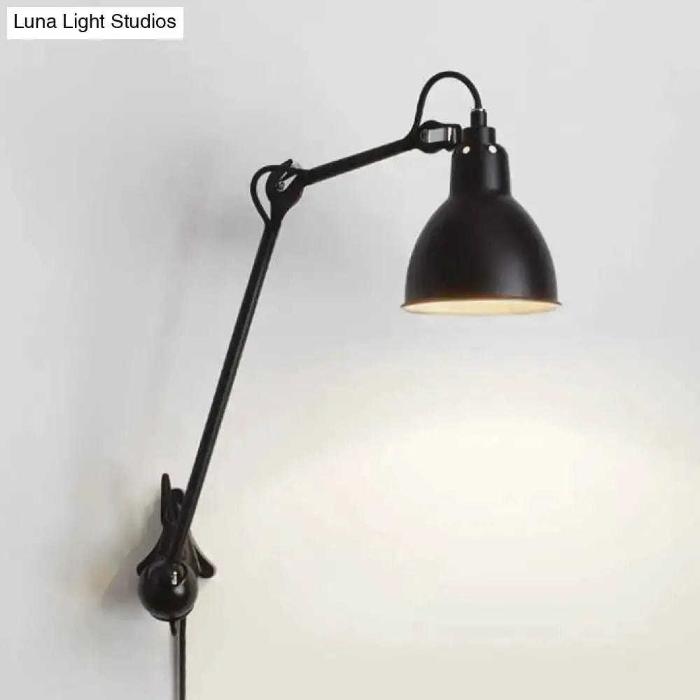 Industrial black wall lamp with adjustable arm and dome shade on Tampa Home & Garden Store