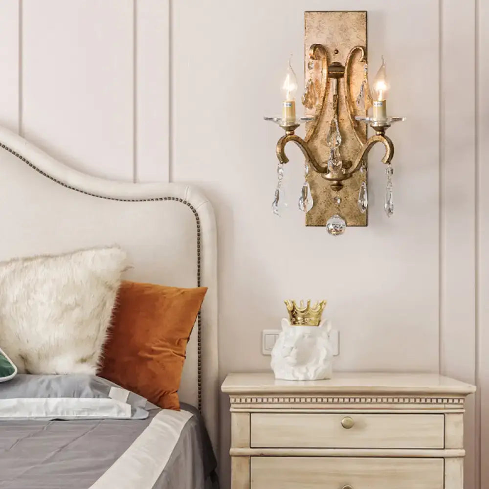Rust Iron Crystal Teardrop Wall Sconce with gold finish, crystal drops, dual candle bulbs on Tampa Home & Garden Store