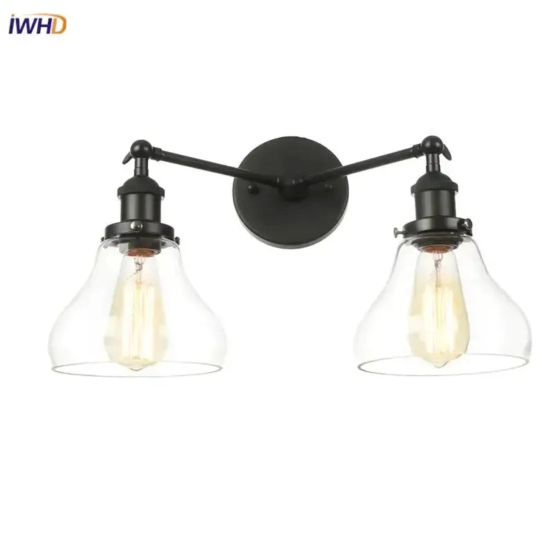Two-light black metal LED wall lamp with clear glass bell shades by Decorbites on Tampa Home & Garden Store