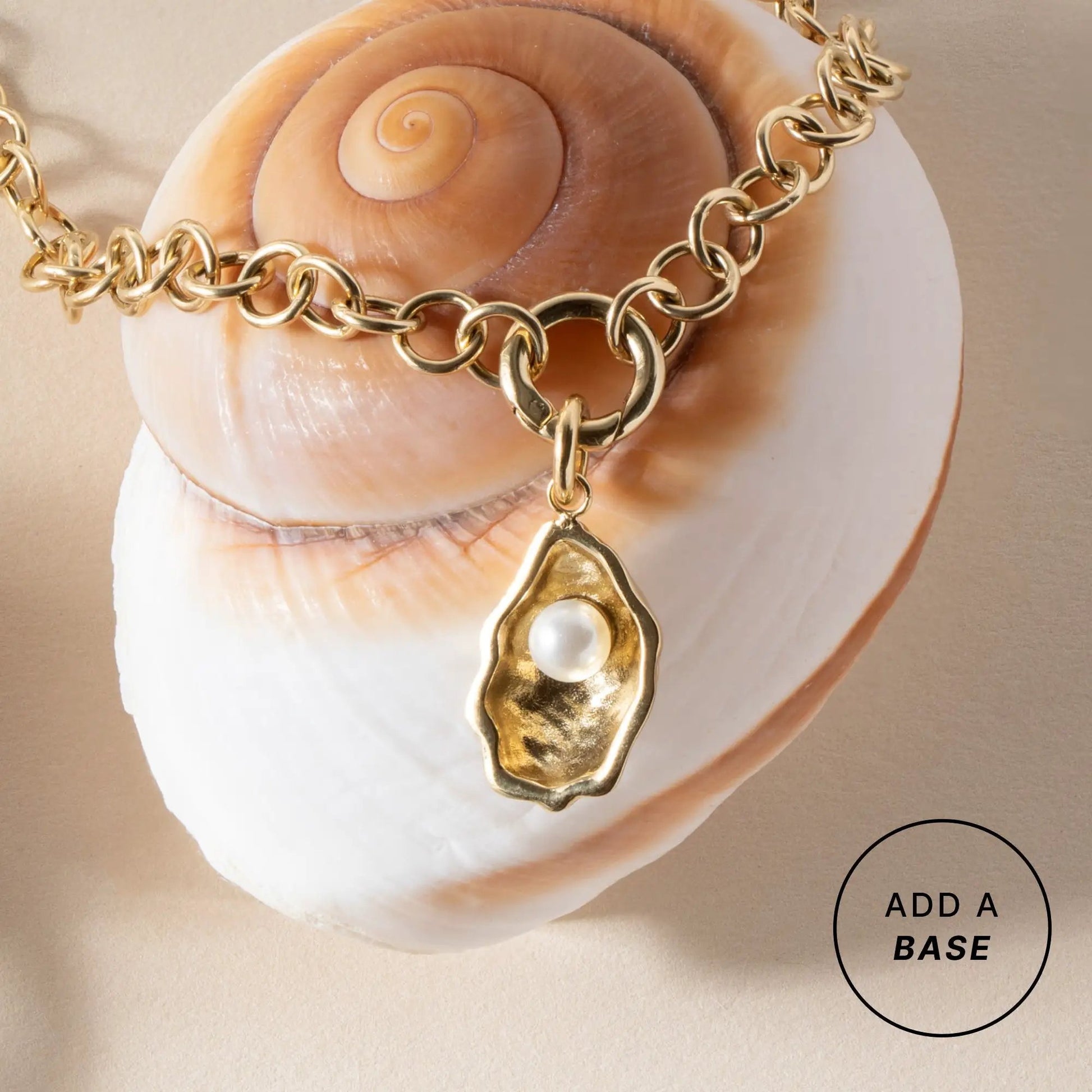 Oyster Interchangeable Charm gold-tone pendant with pearl centerpiece on a chunky chain by Alex and Ani on Tampa Home & Garden Store