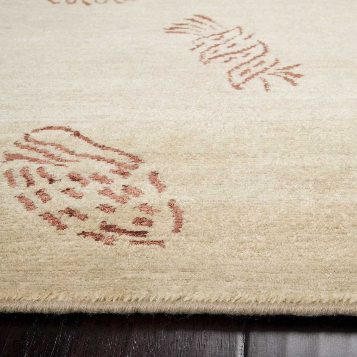 Yellow premium thick wool rug by Boutique Rugs with red decorative motifs and fringed edge on Tampa Home & Garden Store