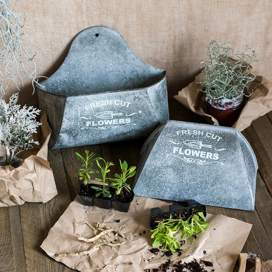Iron Flower Wall Planter by RusticReach; 2 gray metal planters featuring Fresh Cut Flowers on Tampa Home & Garden Store