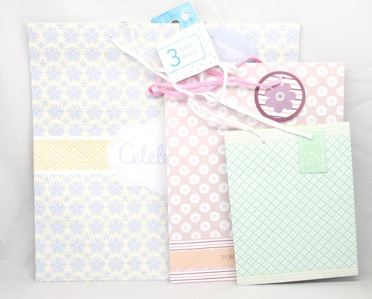 Three Piece Celebration Gift Bag Set With Tags featuring pastel floral and geometric bags on Tampa Home & Garden Store