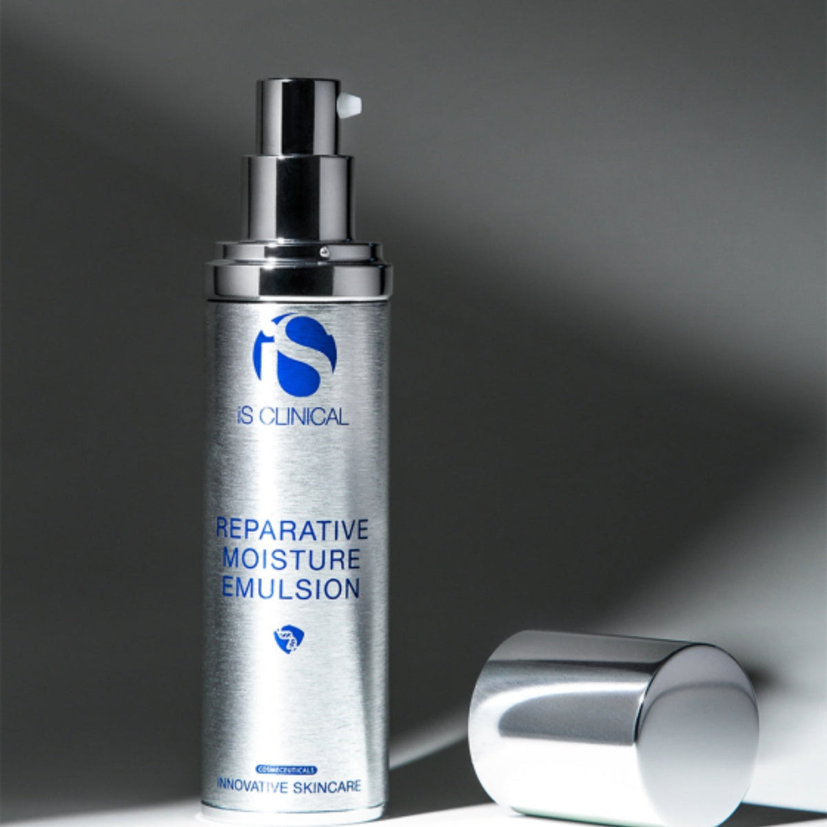 iS Clinical Reparative Moisture Emulsion facial moisturizer bottle with a silver pump and blue logo on Tampa Home & Garden Store
