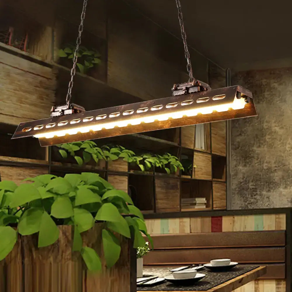Rust Iron Island Light pendant, rust-finish iron bar with perforated sides, chain hung on Tampa Home & Garden Store