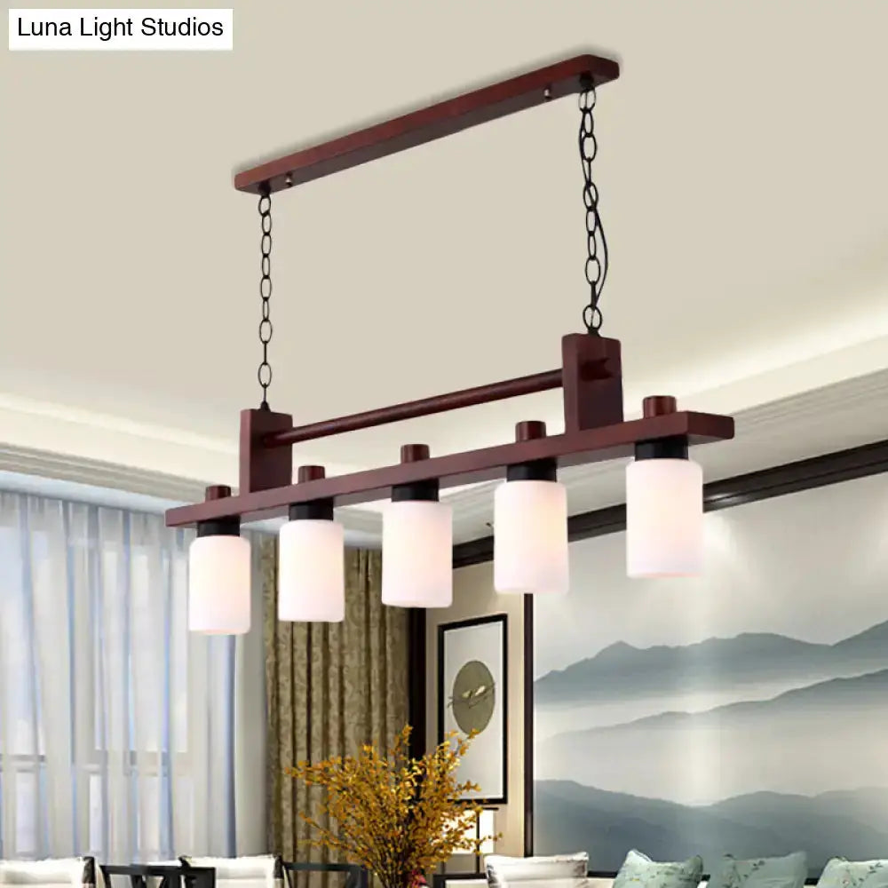 Traditional linear wood island pendant with opal glass shades dark brown finish five lights on Tampa Home & Garden Store