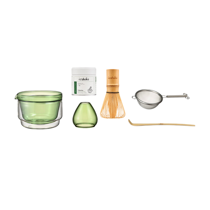 Isshiki x Hario Yabukita Tin Matcha Set with white tin, bamboo whisk, chashaku, strainer, and glass cups on Tampa Home & Garden Store
