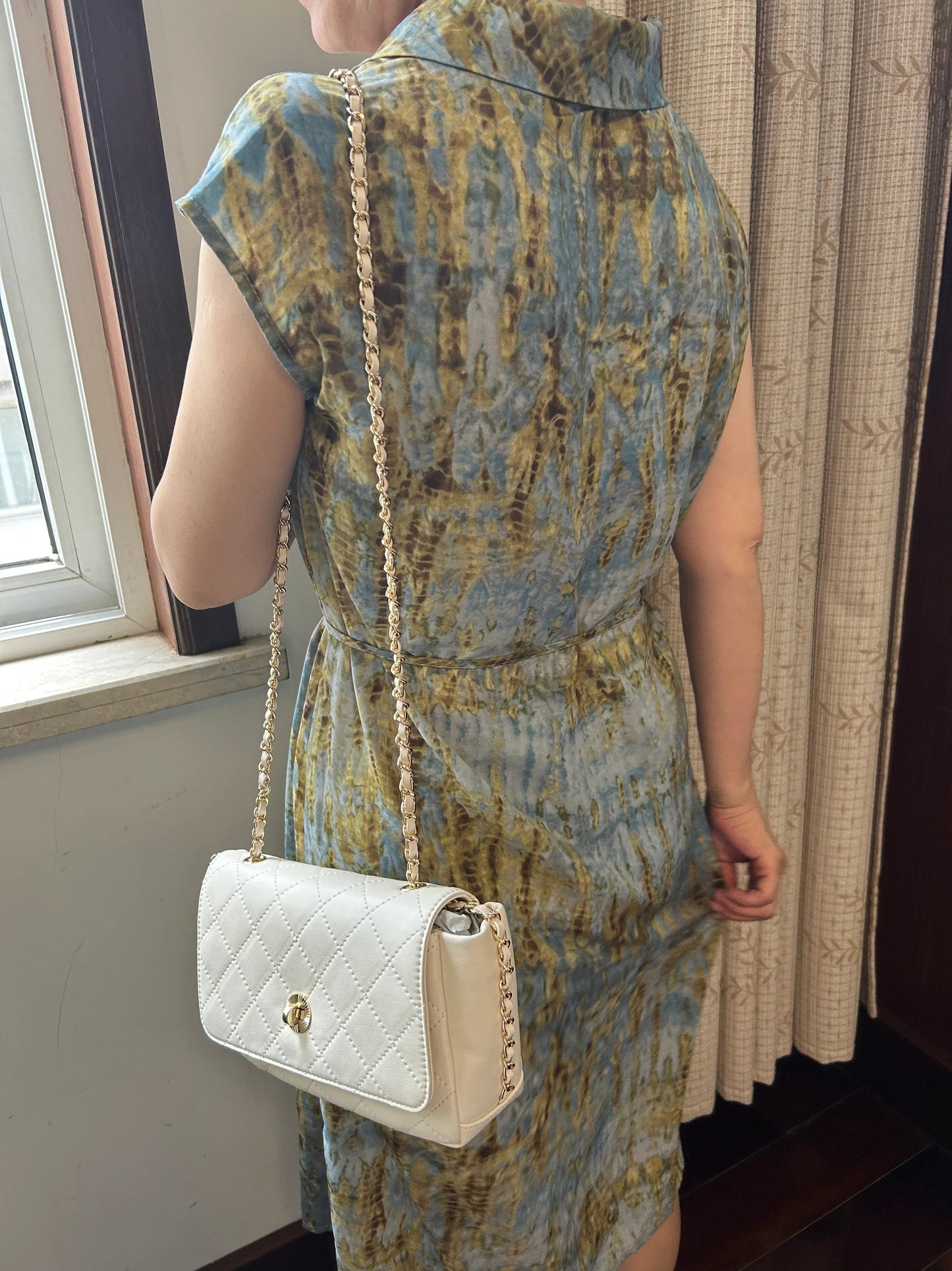 Ivory Quilted Leather Crossbody Bag with Gold Chain Strap