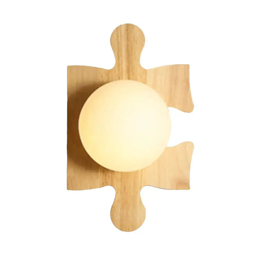 Wooden Puzzle Wall Light by Decorbites with natural wood finish and frosted globe bulb on Tampa Home & Garden Store