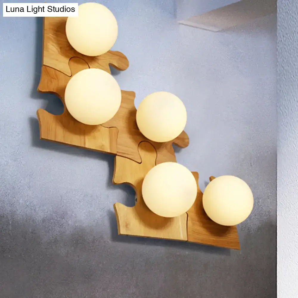 Wooden Puzzle Wall Light by Decorbites with interlocking jigsaw panels and 5 warm globe bulbs on Tampa Home & Garden Store