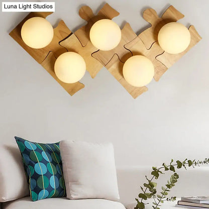 Wooden Puzzle Wall Light by Decorbites with natural wood finish and 5 globe bulbs on Tampa Home & Garden Store