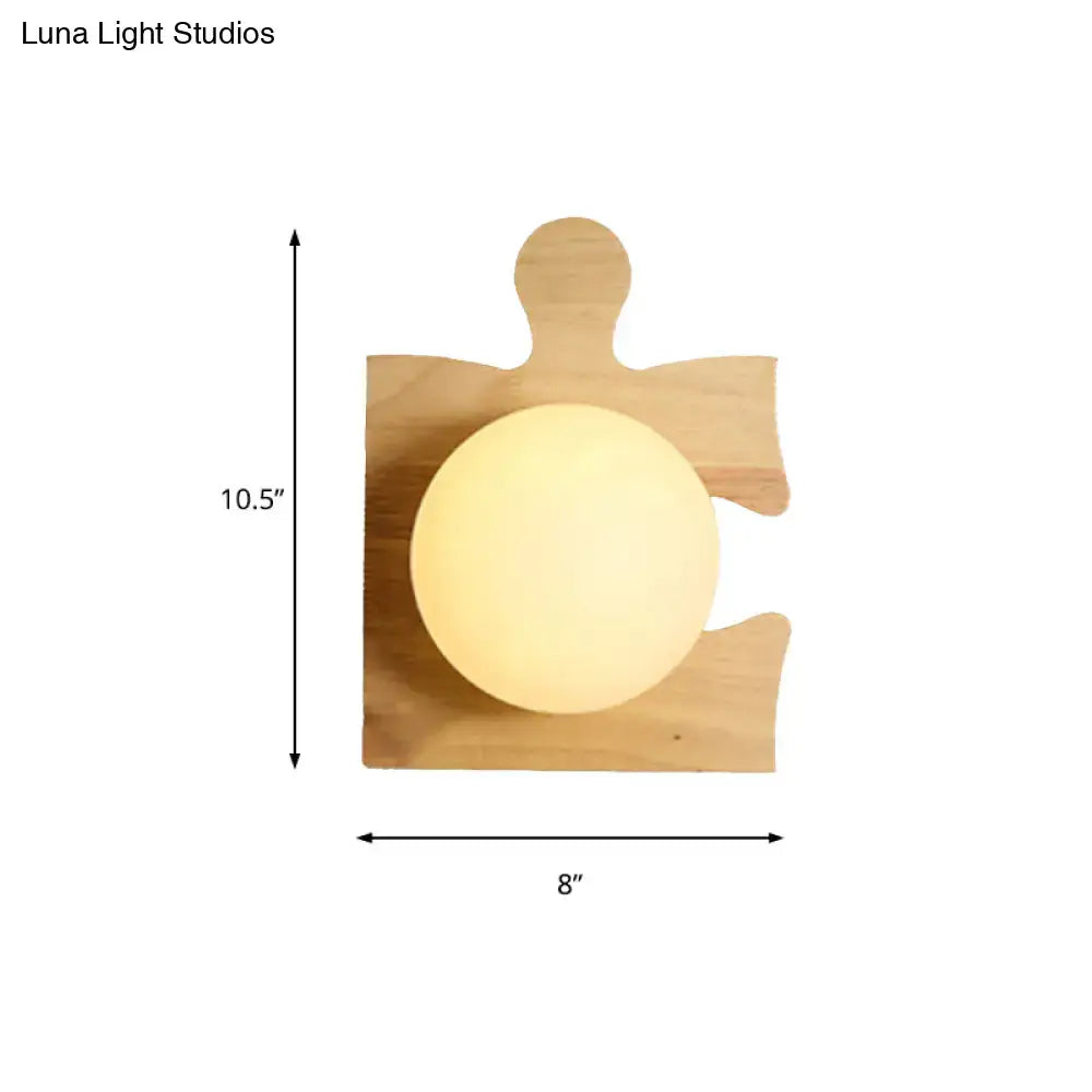 Wooden Puzzle Wall Light by Decorbites with warm globe on natural wood puzzle panel on Tampa Home & Garden Store