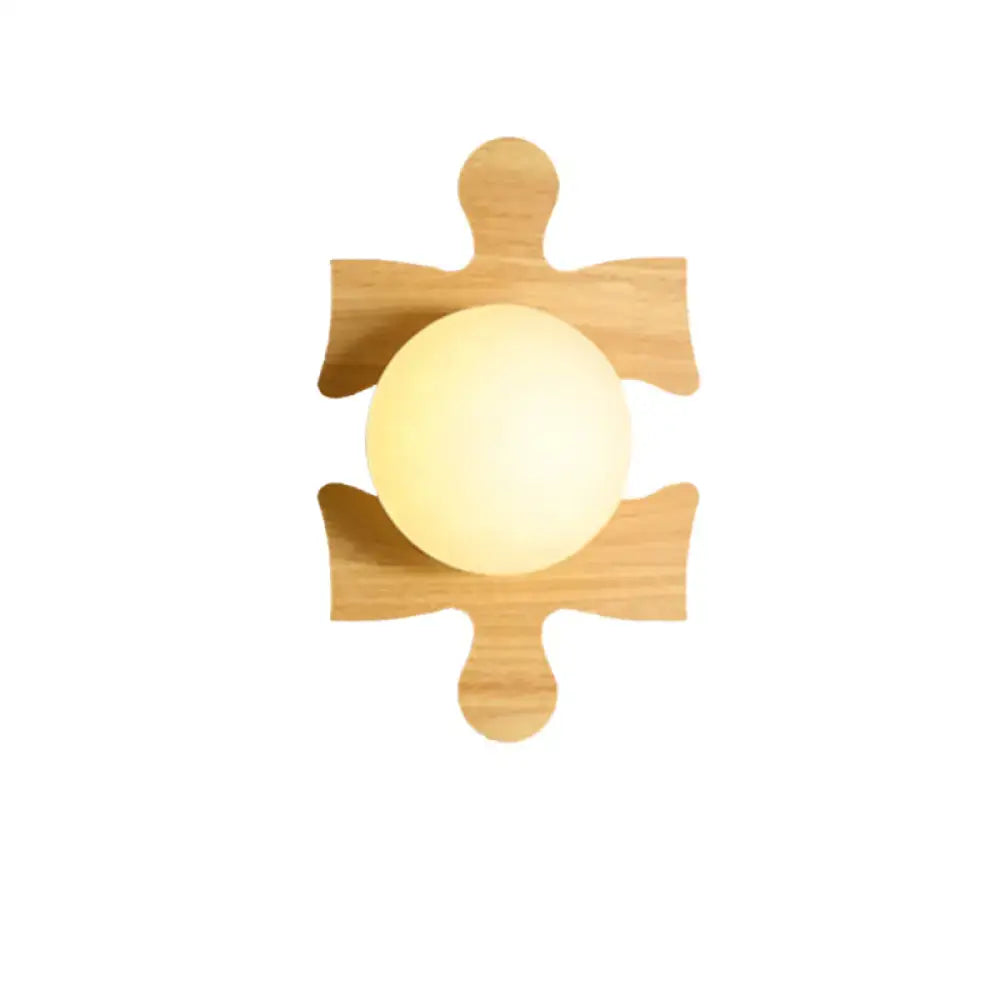 Wooden puzzle wall light with natural wood finish and warm white globe by Decorbites on Tampa Home & Garden Store