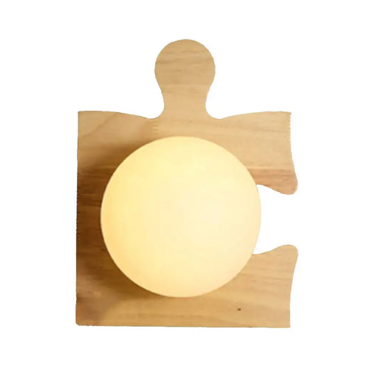 Wooden puzzle wall light by Decorbites with round frosted globe on natural wood backplate on Tampa Home & Garden Store