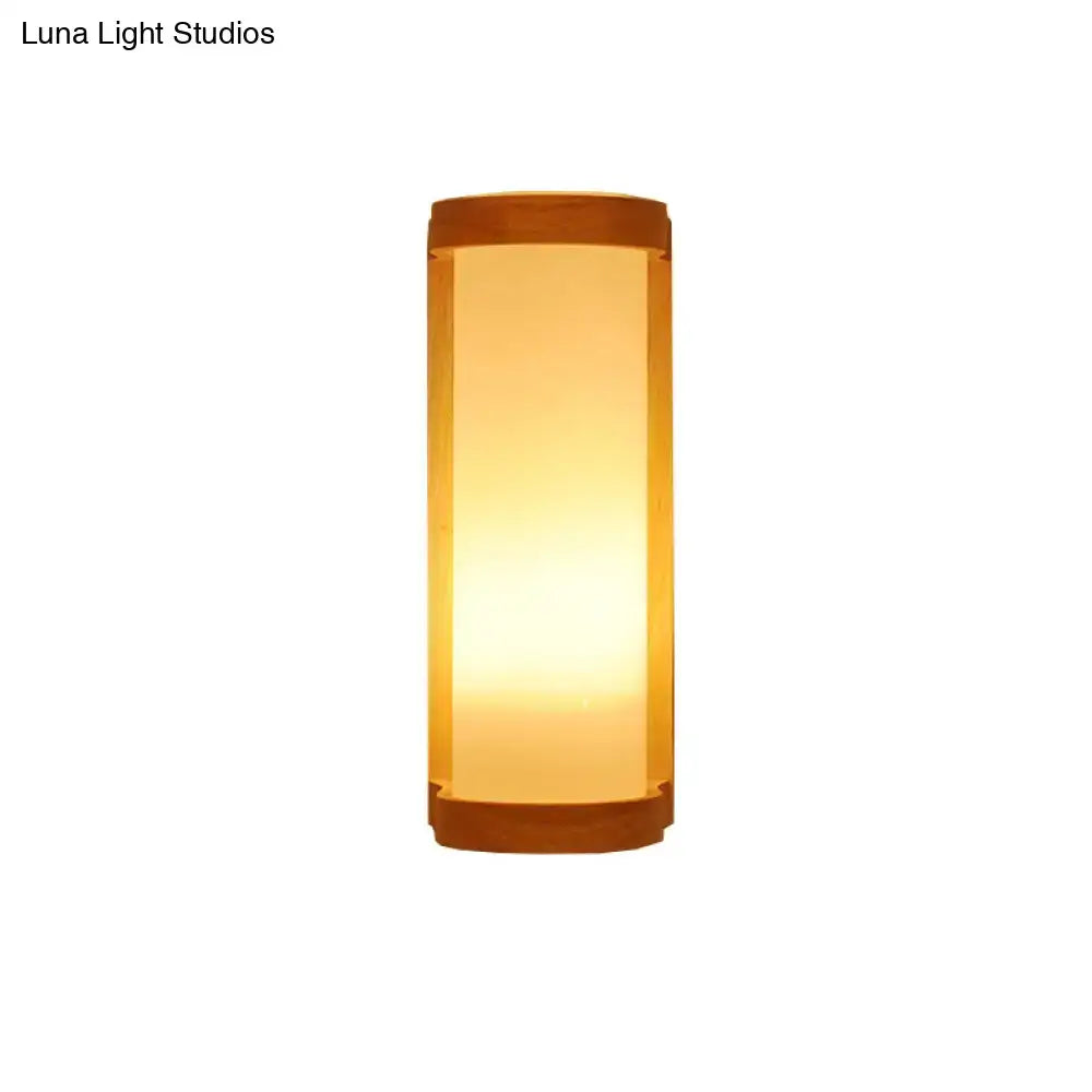 Wood Glass Japanese Compact Wall Sconce by Decorbites; warm amber glow on Tampa Home & Garden Store