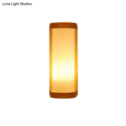 Wood Glass Japanese Compact Wall Sconce by Decorbites; warm amber glow on Tampa Home & Garden Store