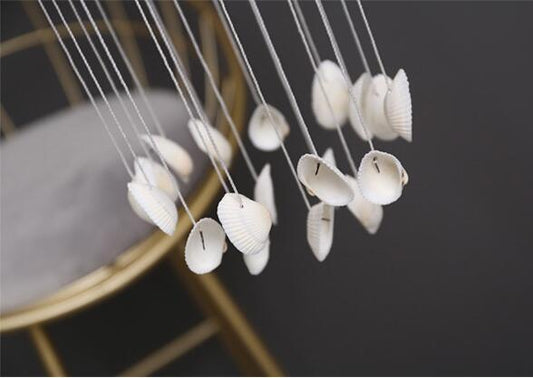 White natural shell wind chimes with hanging shells for outdoor garden decor patio yard on Tampa Home & Garden Store