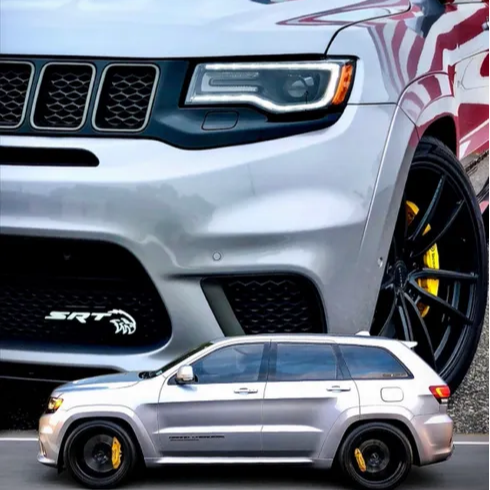 Jeep Trackhawk RGBW Flow Series LED Grill Emblem; exterior LED lighting, two Jeeps shown on Tampa Home & Garden Store