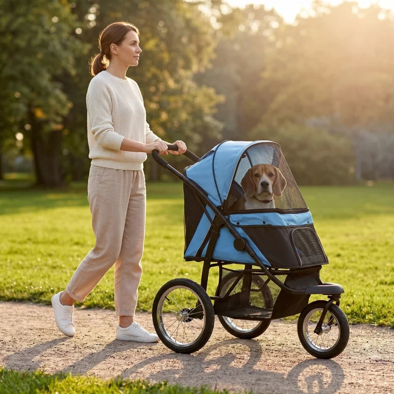 Blue 3-wheel pet stroller for small to medium dogs with mesh canopy, dog inside on park path on Tampa Home & Garden Store