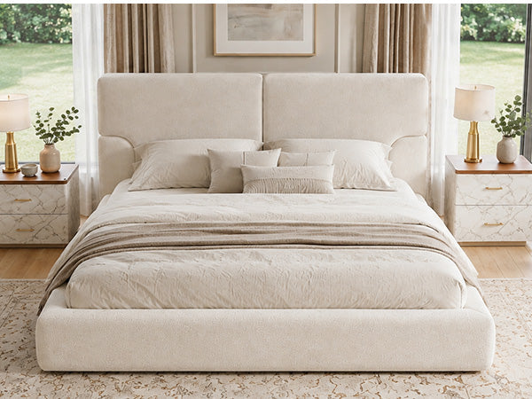 King platform bed frame with padded beige fabric headboard and two nightstands on Tampa Home & Garden Store