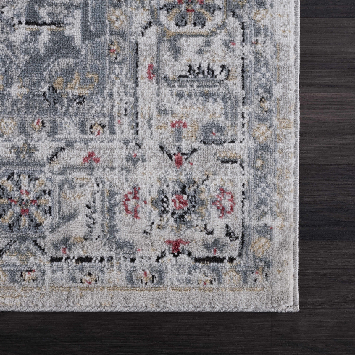 Billings Area Rug by Boutique Rugs in blue-gray with fringe on floor on Tampa Home & Garden Store
