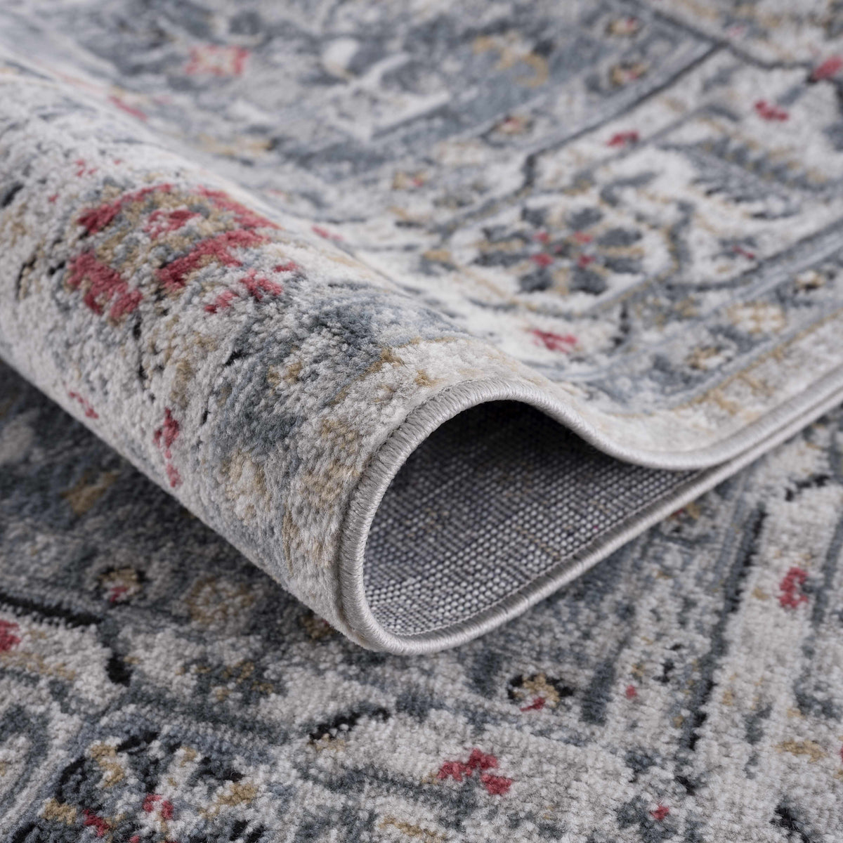 Billings Area Rug by Boutique Rugs in gray-blue with red beige accents on Tampa Home & Garden Store