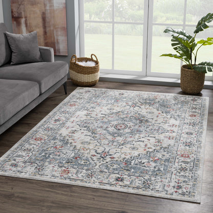 Billings Area Rug by Boutique Rugs in blue gray with distressed pattern on Tampa Home & Garden Store