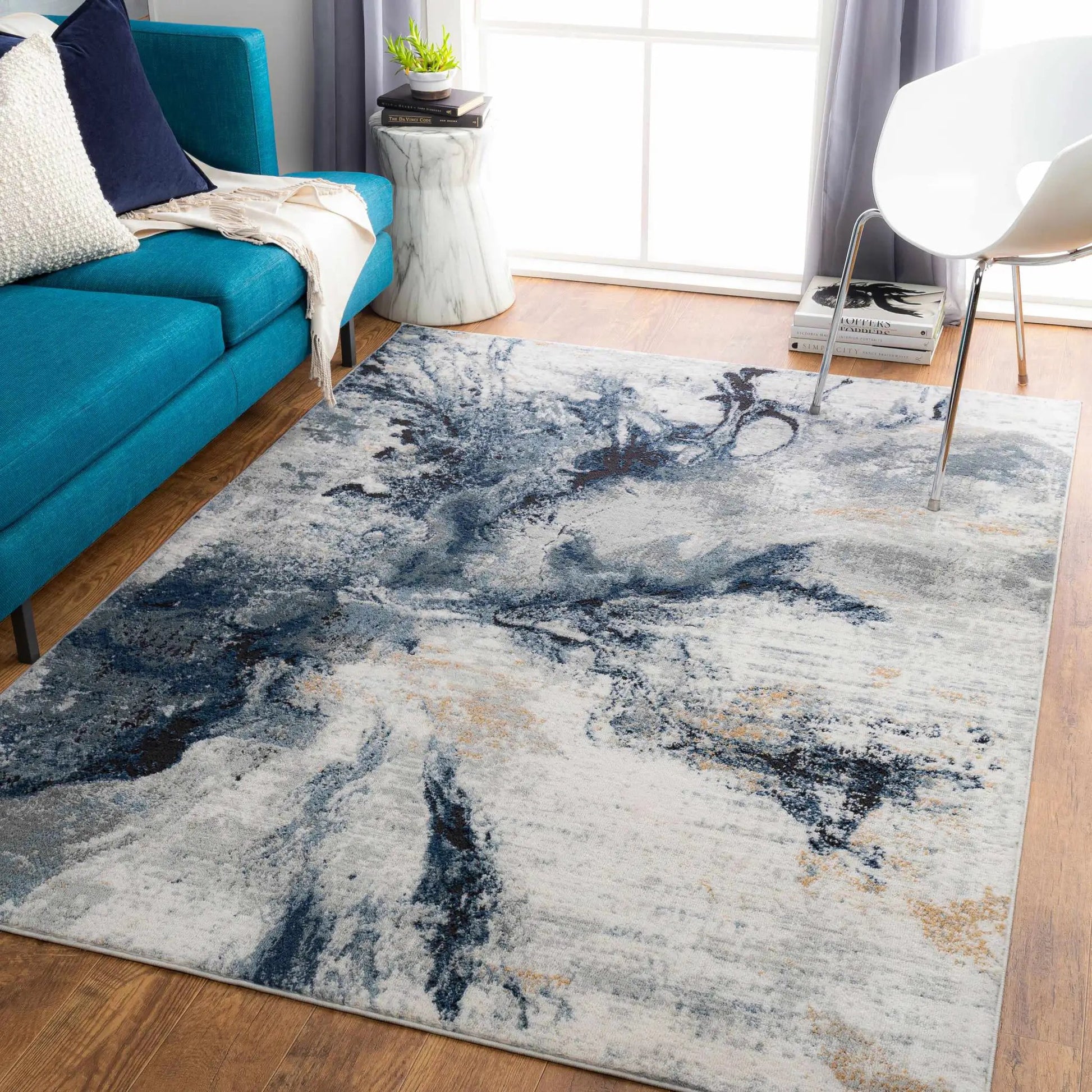 Kirkland dark blue marble rug, abstract blue-gray rug by Boutique Rugs in a living space on Tampa Home & Garden Store