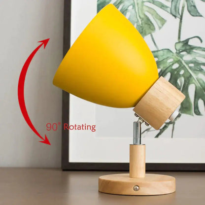 Yellow wood wall lamp with conical shade on a wooden base and 90-degree rotating tilt on Tampa Home & Garden Store