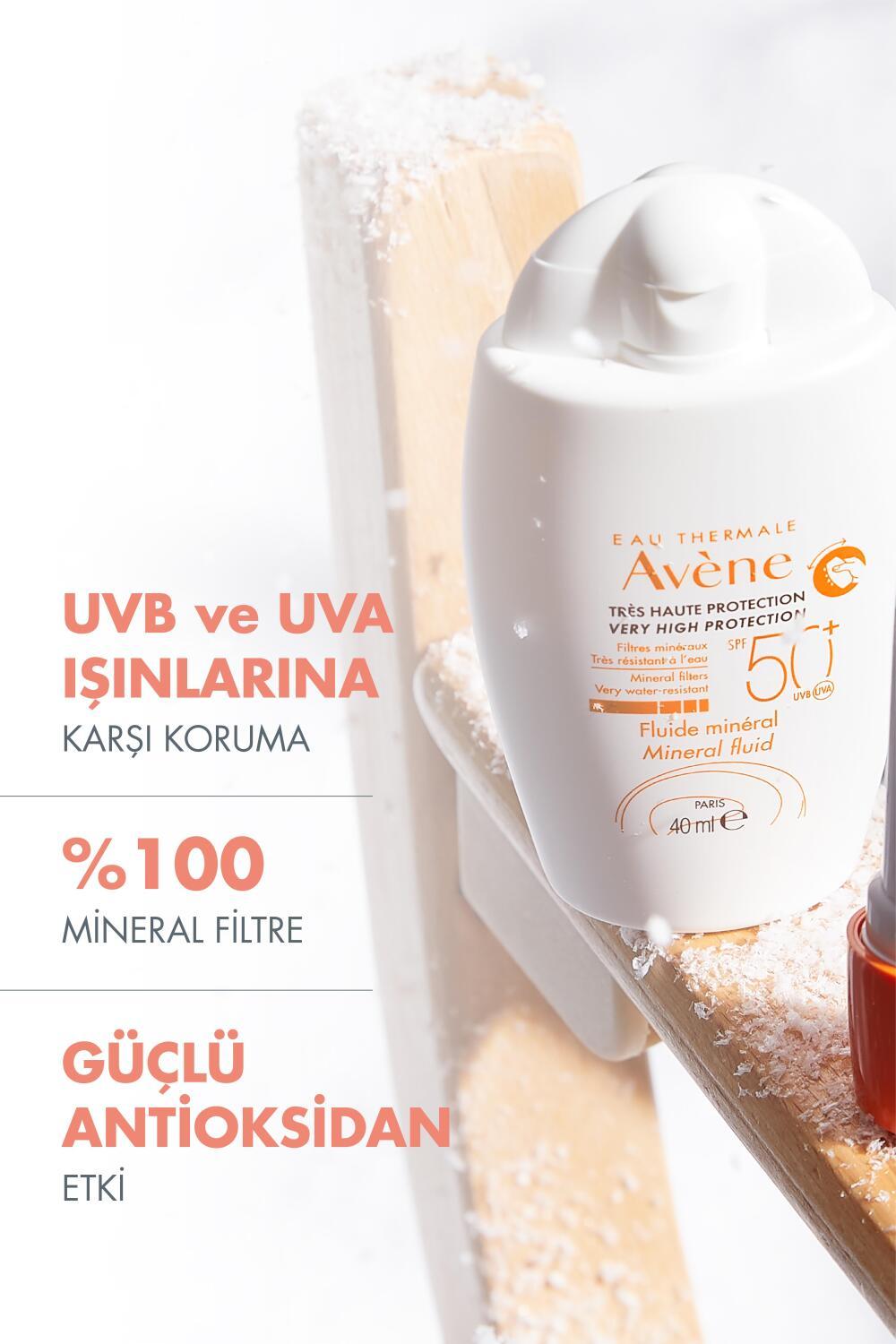 Avène mineral sunscreen SPF 50+ bottle, white with orange branding, on frosty wooden rail on Tampa Home & Garden Store