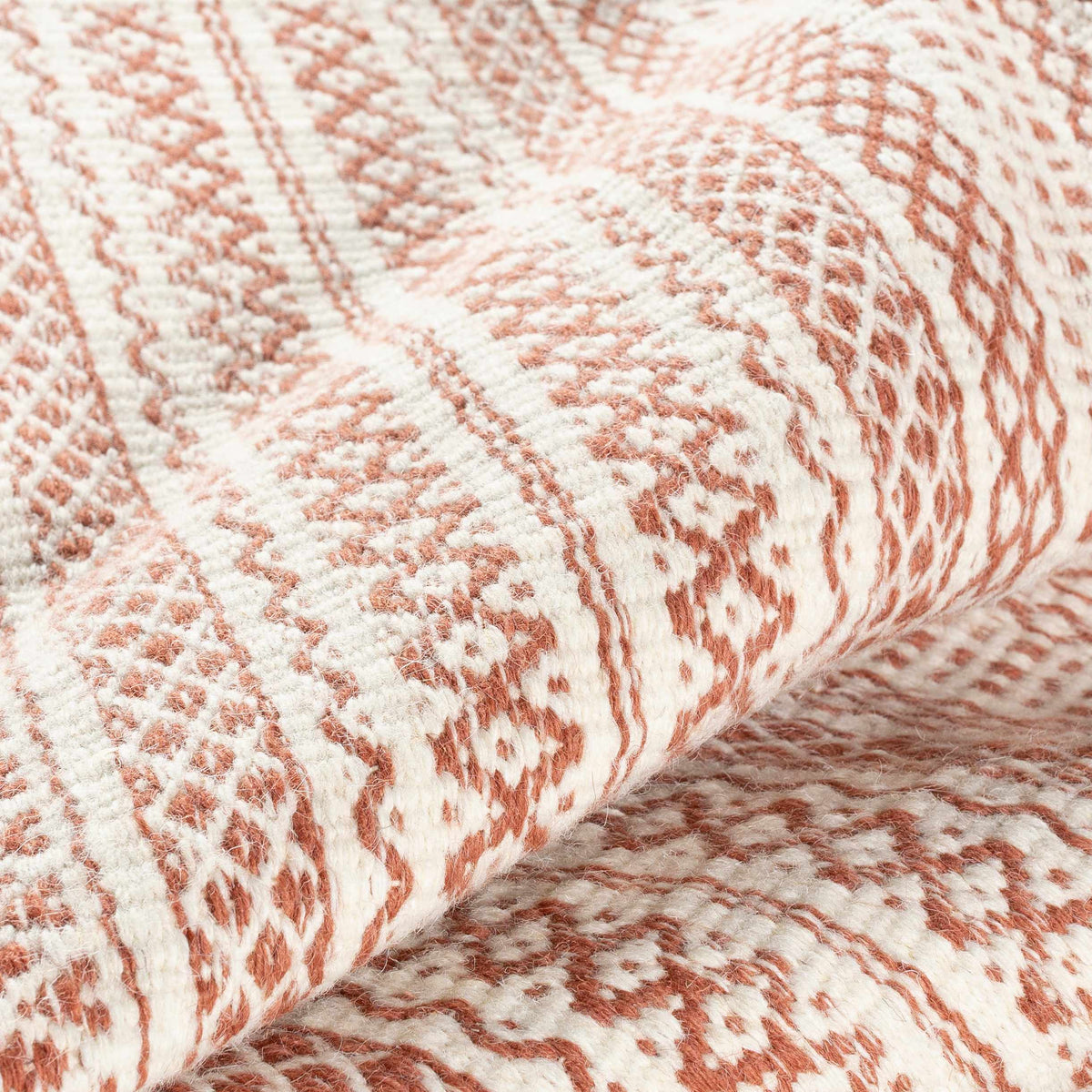 Kalinga red/cream flatweave wool rug by Boutique Rugs, clearance, close-up texture on Tampa Home & Garden Store