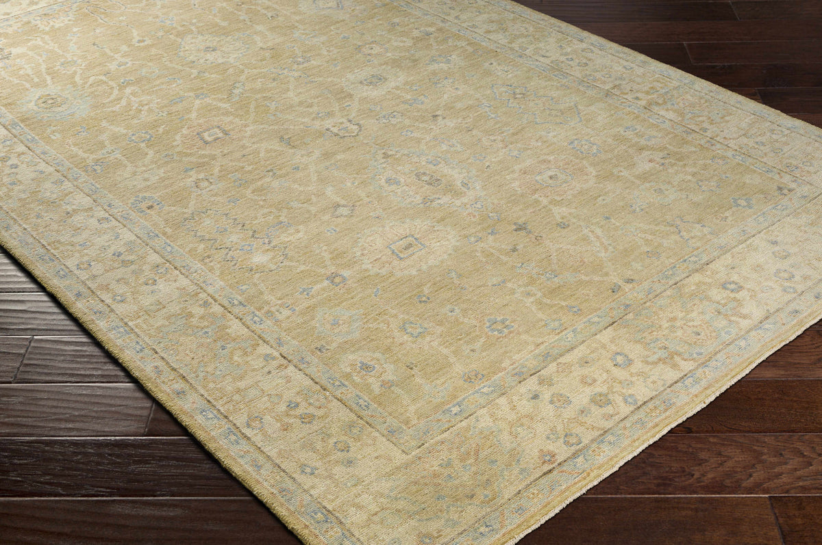 Karalee Handmade Wool Area Rug beige with light blue motifs by Boutique Rugs on Tampa Home & Garden Store