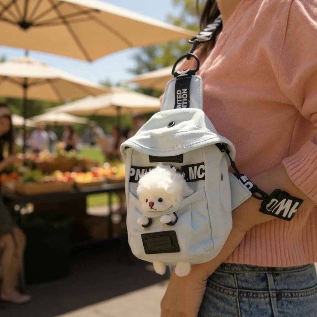 Shaketea Kawaii denim crossbody sling bag in light blue with a white fluffy sheep charm on Tampa Home & Garden Store