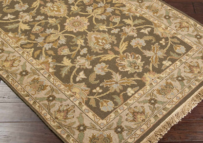 Kelseyville area rug by Boutique Rugs with olive and beige floral pattern and fringe border on Tampa Home & Garden Store