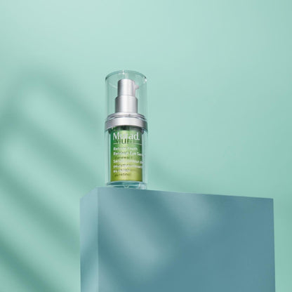 Murad Retinol Youth Renewal Eye Serum bottle with silver pump and clear cap on a teal pedestal on Tampa Home & Garden Store