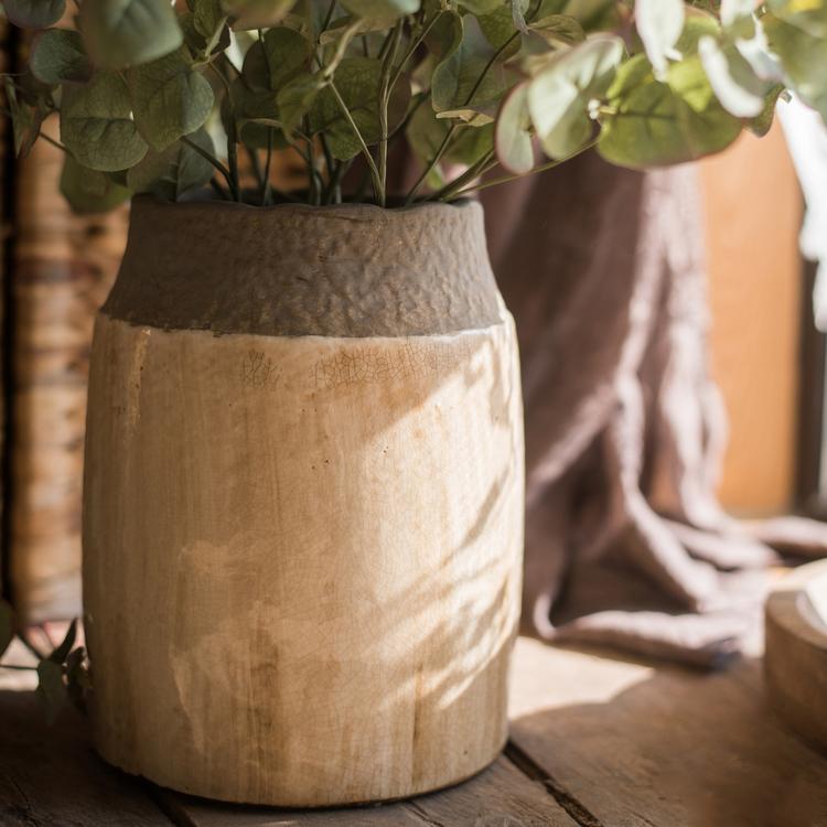 Khaki Coarse Pottery Jar by RusticReach with dark textured top rim holding greenery on Tampa Home & Garden Store