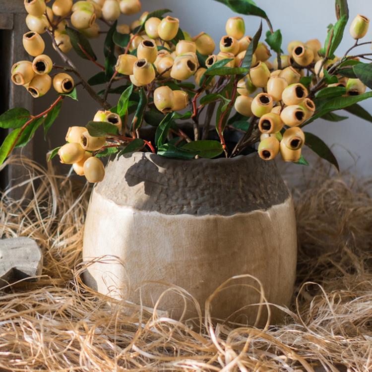 Khaki coarse pottery jar with dark gray top and beige body on Tampa Home & Garden Store