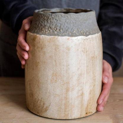 Khaki coarse pottery jar by RusticReach, cream body with textured dark gray rim on Tampa Home & Garden Store