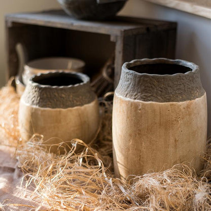 Khaki Coarse Pottery Jars by RusticReach; two beige jars with dark gray rims on straw on Tampa Home & Garden Store