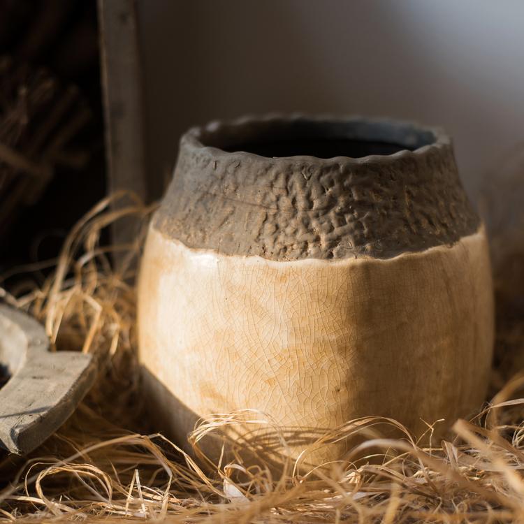Khaki coarse pottery jar by RusticReach with a two-tone tan body and dark textured rim on Tampa Home & Garden Store