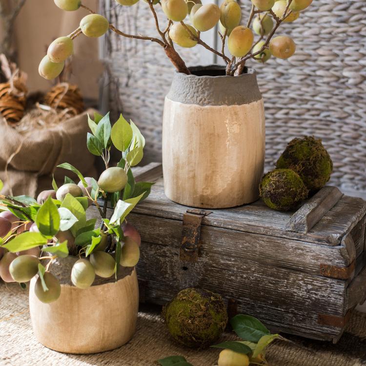 Khaki coarse pottery jar by RusticReach with gray rim, atop a weathered crate on Tampa Home & Garden Store